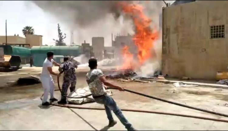 حريق بالساحة الخارجية لمبنى البيئة التابع لبلدية الجيزة