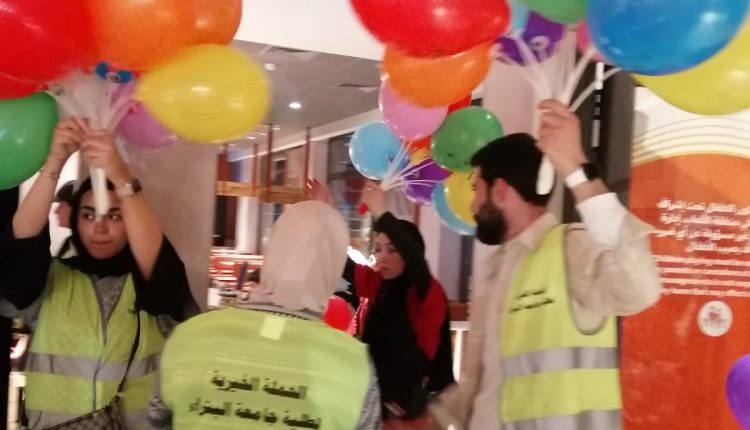 طلبة جامعة البترا ينظمون إفطارًا لأيتام من سحاب