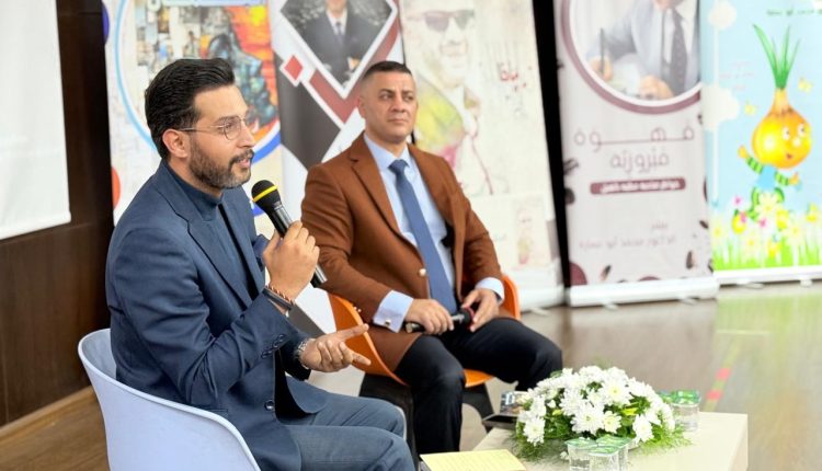 د. أبو عمارة يشهر كتاب ( عندما يتكلم الجمال )